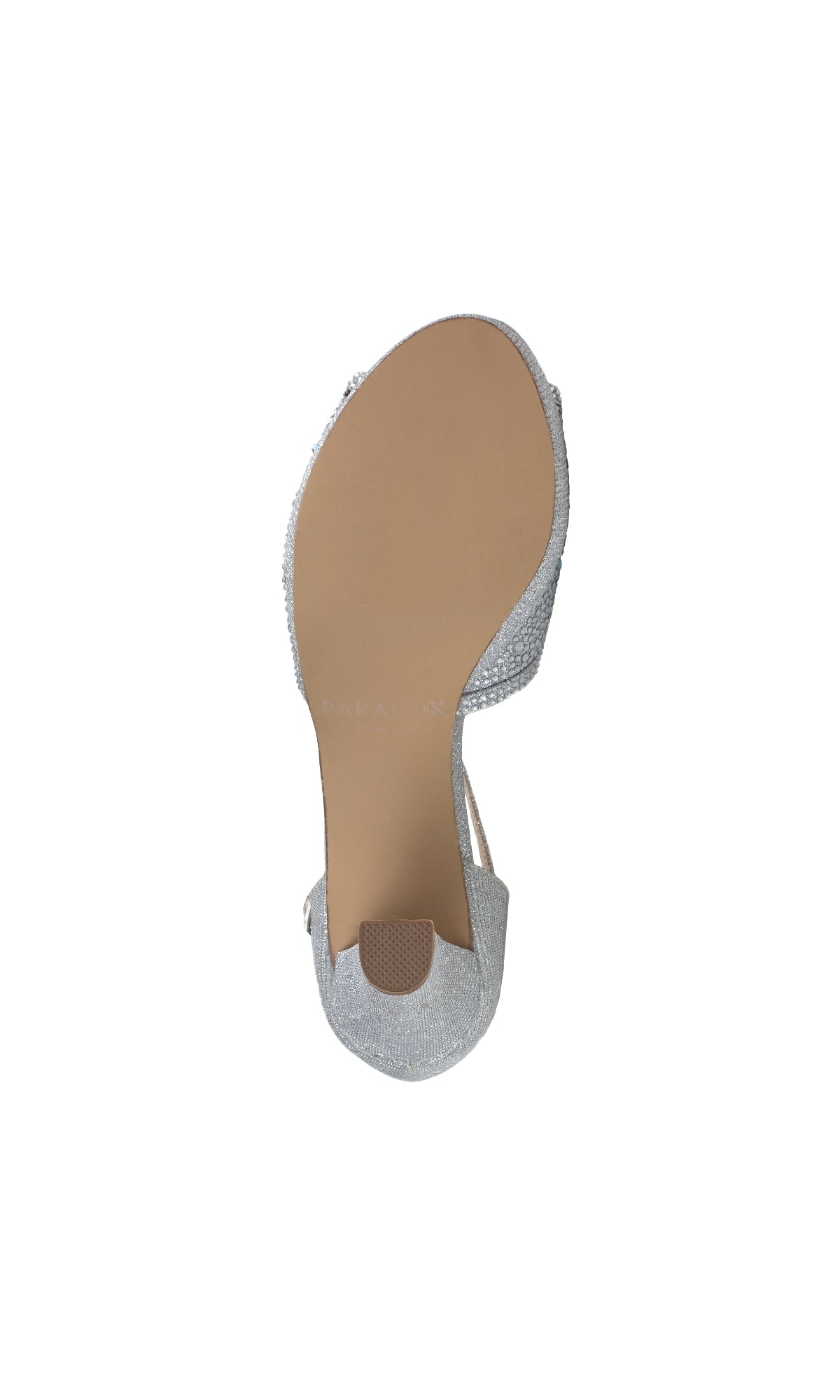 The Nora Silver Shimmer Prom Shoe (Paradox London P2226) is shown from the bottom, featuring stiletto heels, a tan sole, and a textured pad at the toe area.
